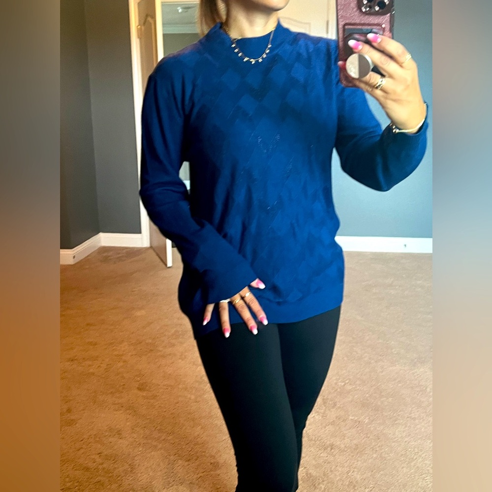 Women brand new sweater. Never worn.
